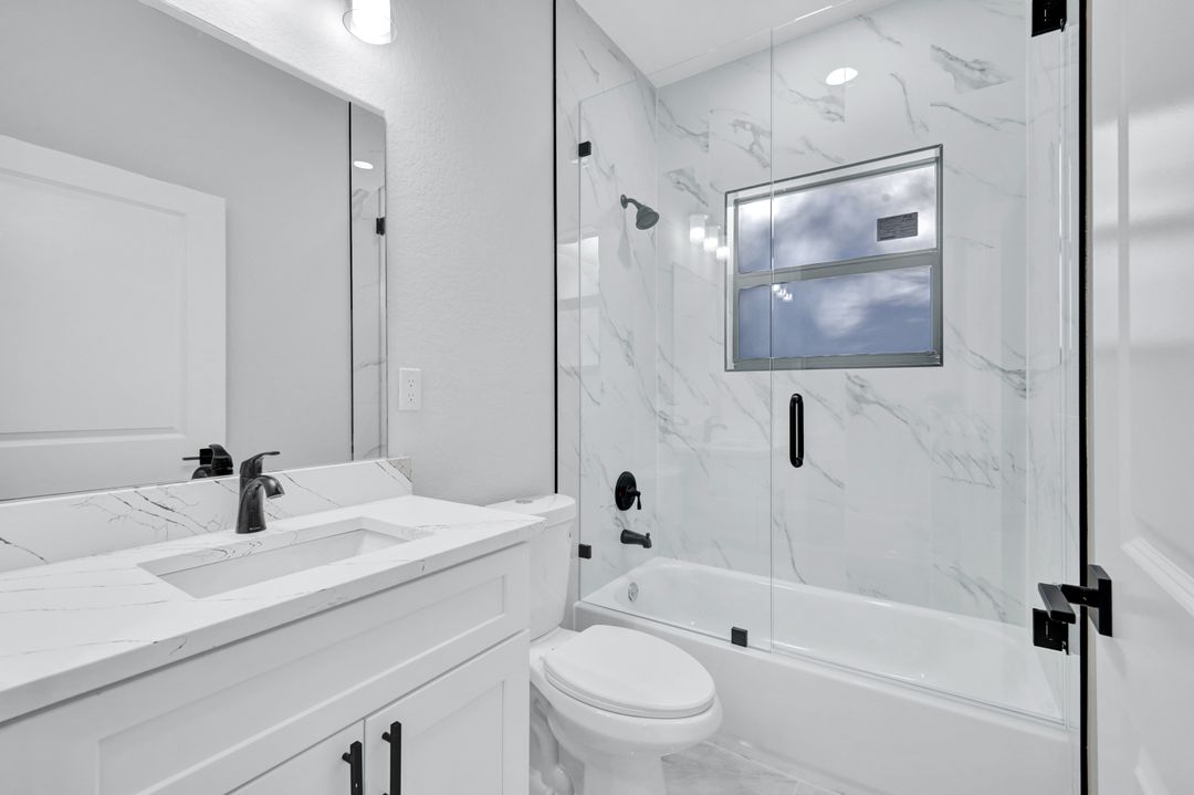 1222 Hilliard St E, Lehigh Acres, FL 33974