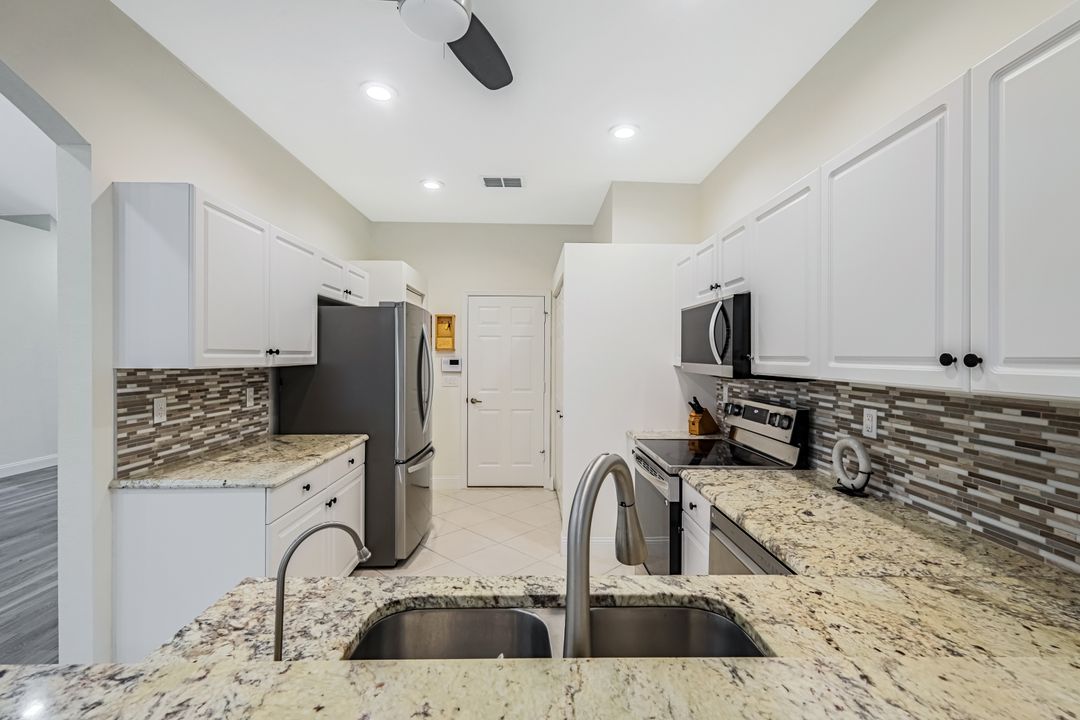 7488 Berkshire Pines Dr, Naples, FL 34104