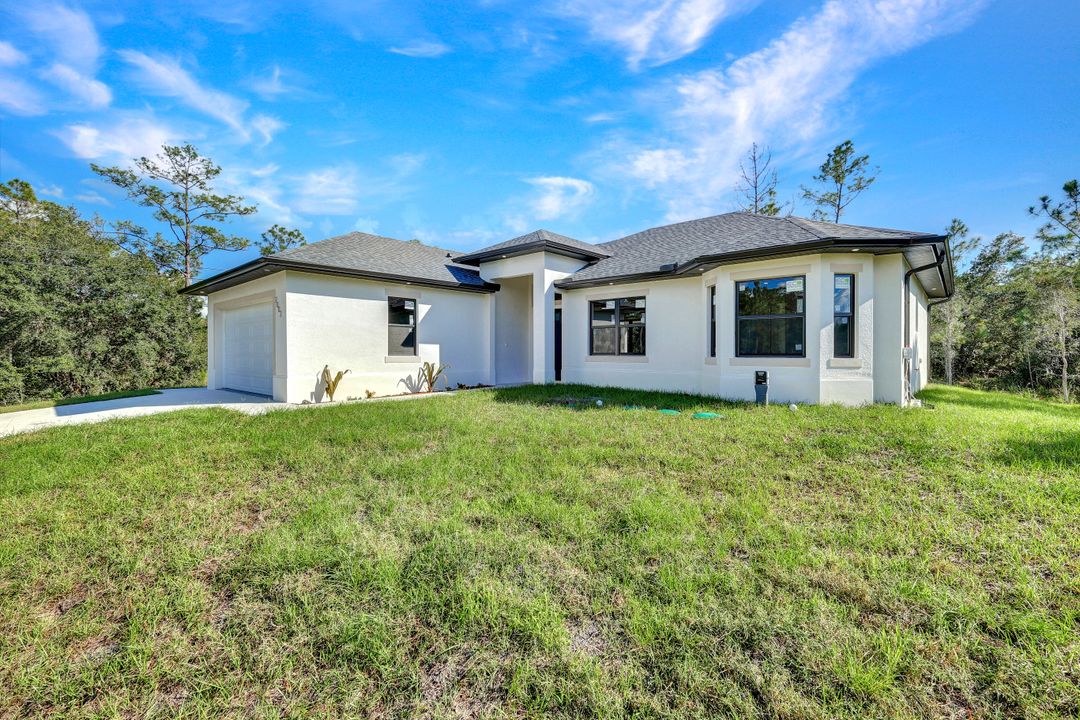 2002 East 10th Street, Lehigh Acres, FL 33936