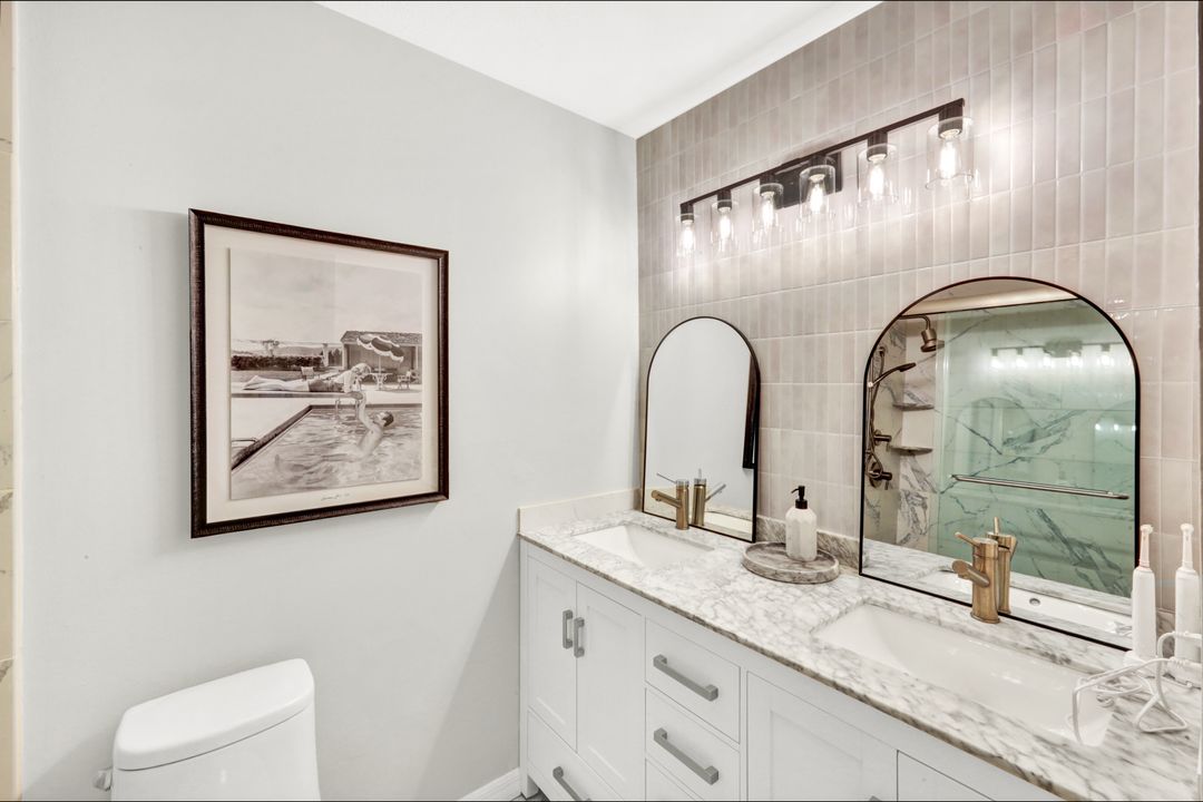 1285 Grand Canal Dr, Naples, FL 34110