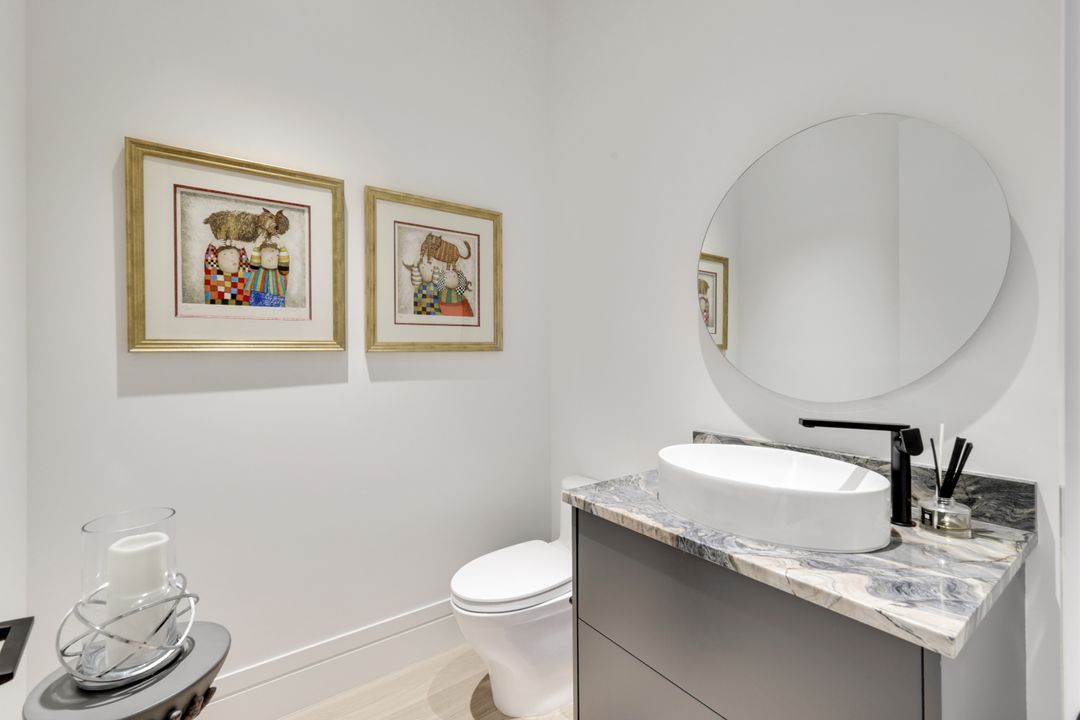 493 Carica Rd, Naples, FL 34108