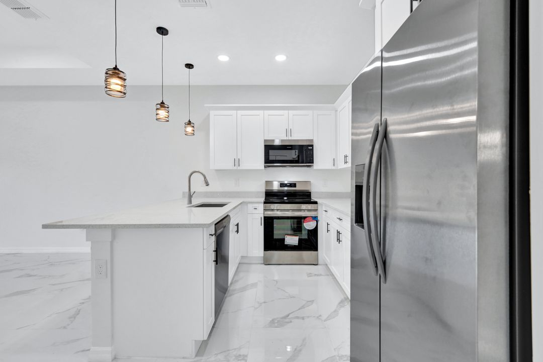 1237 Hillcrest St E, Lehigh Acres, FL 33974