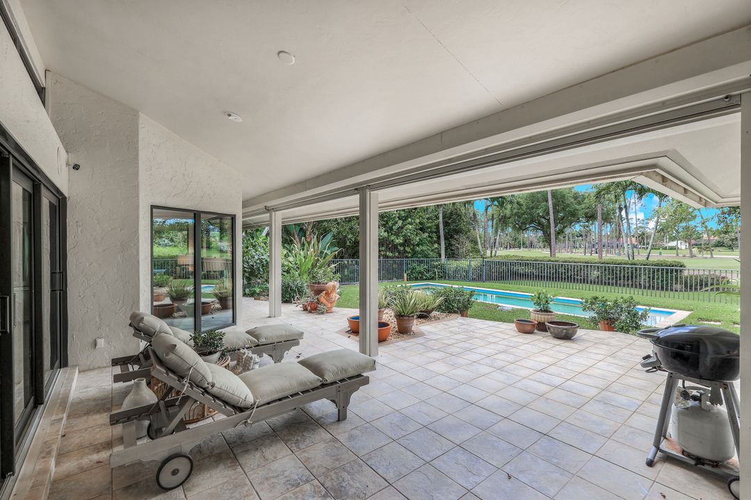 12975 Bald Cypress Ln, Naples, FL 34119