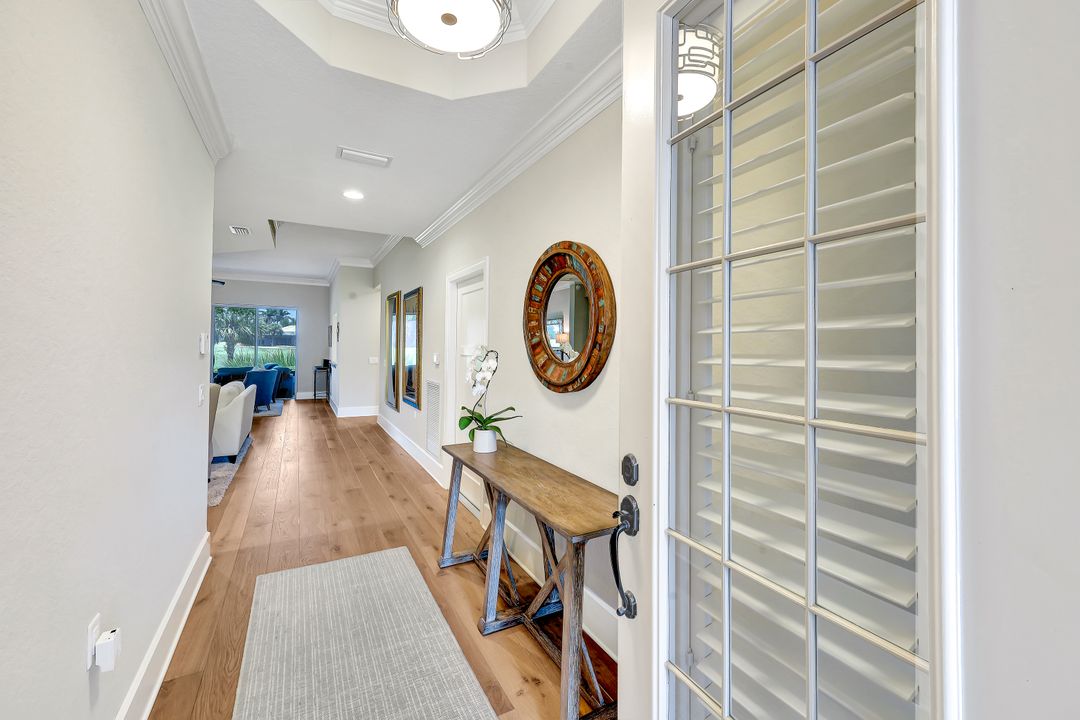 9061 Whimbrel Watch Ln #102, Naples, FL 34109