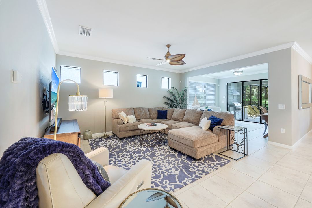 7408 Winding Cypress Dr, Naples, FL 34114