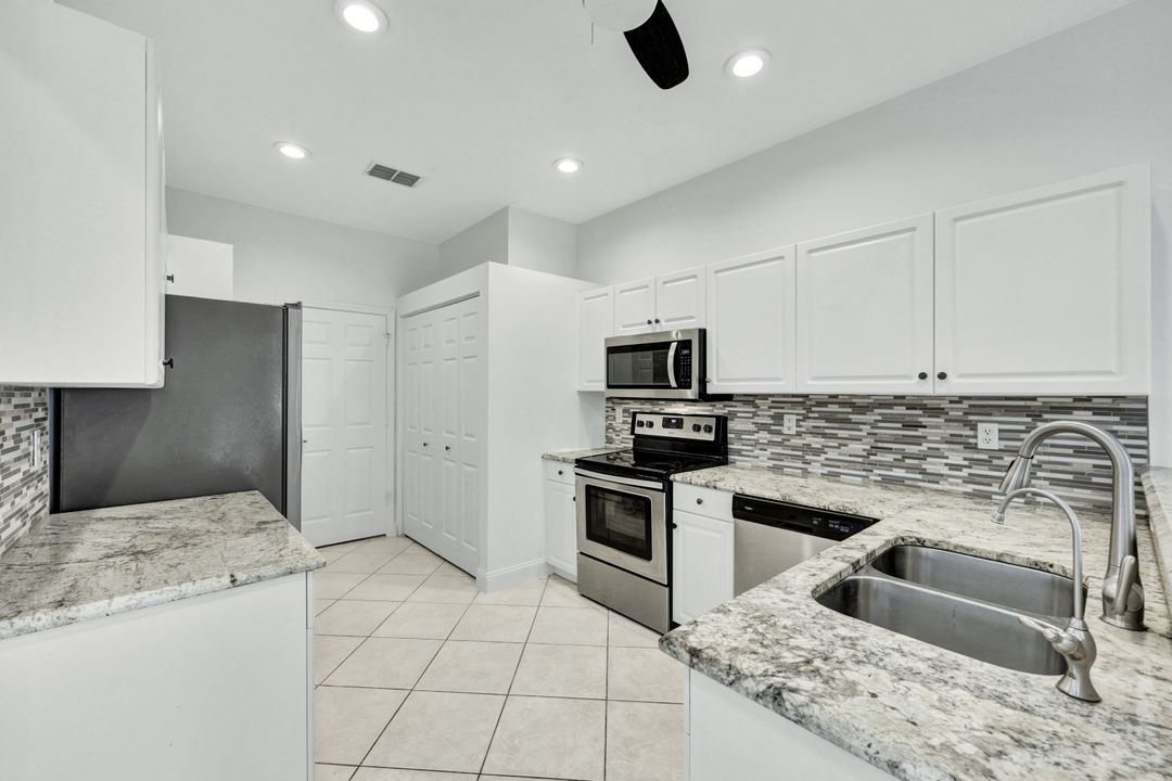 7488 Berkshire Pines Dr, Naples, FL 34104