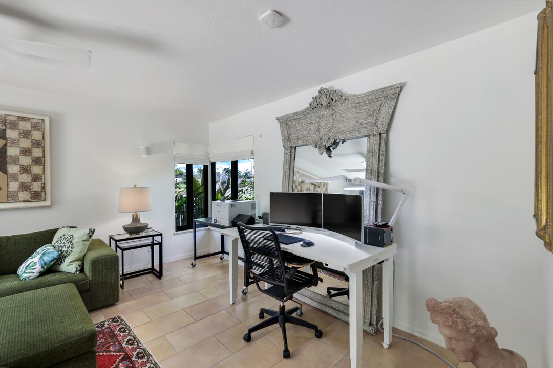 12975 Bald Cypress Ln, Naples, FL 34119