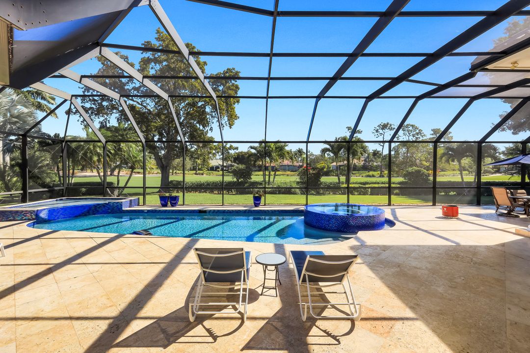 12924 Bald Cypress Ln, Naples, FL 34119