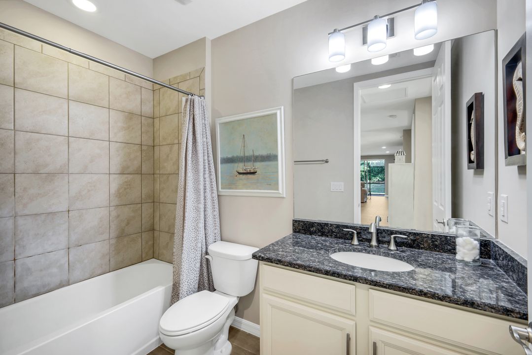 14883 Edgewater Cir, Naples, FL 34114