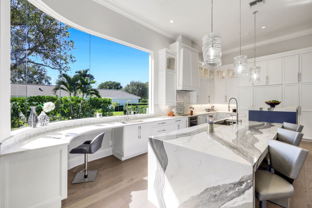 12924 Bald Cypress Ln, Naples, FL 34119