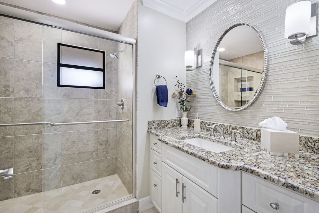 7048 Pelican Bay Blvd #305, Naples, FL 34108