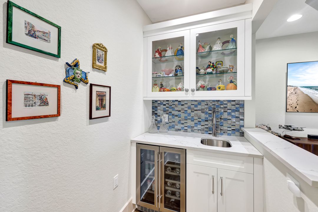 9061 Whimbrel Watch Ln #102, Naples, FL 34109