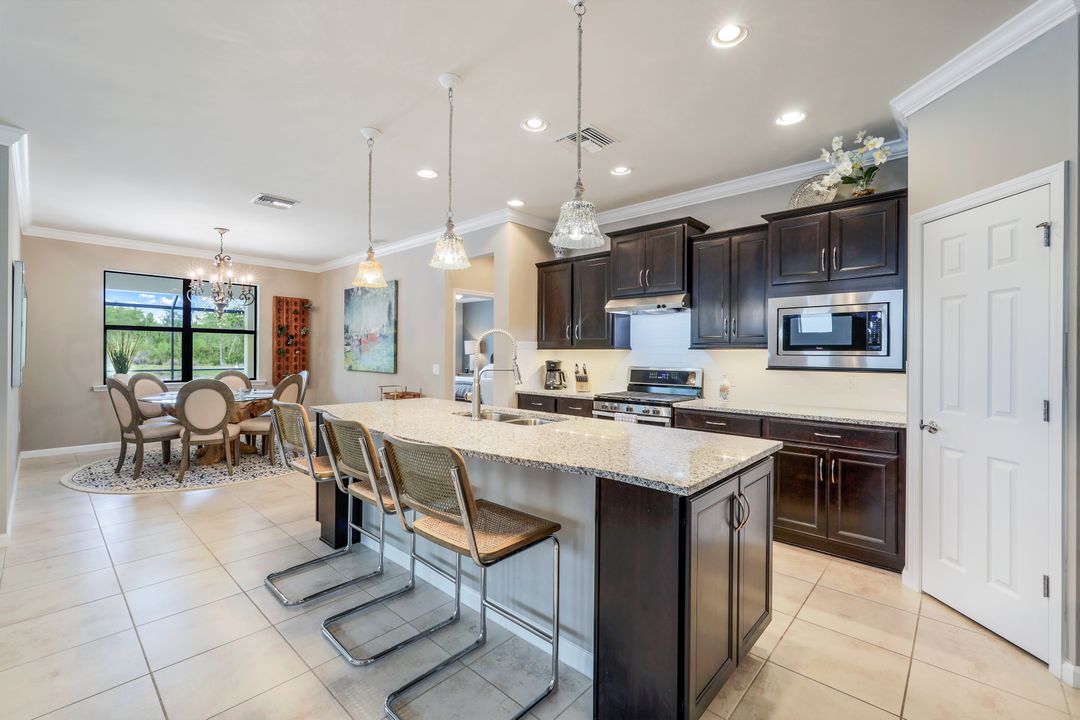 7408 Winding Cypress Dr, Naples, FL 34114