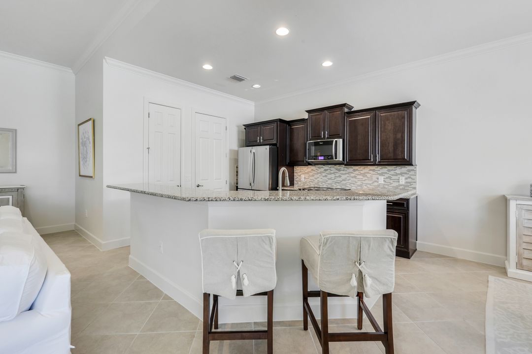 9578 Coquina Cir, Naples, FL 34120