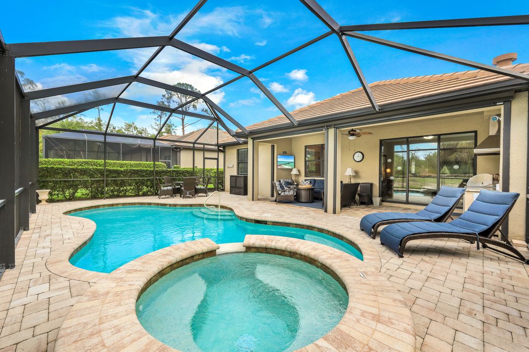 7408 Winding Cypress Dr, Naples, FL 34114