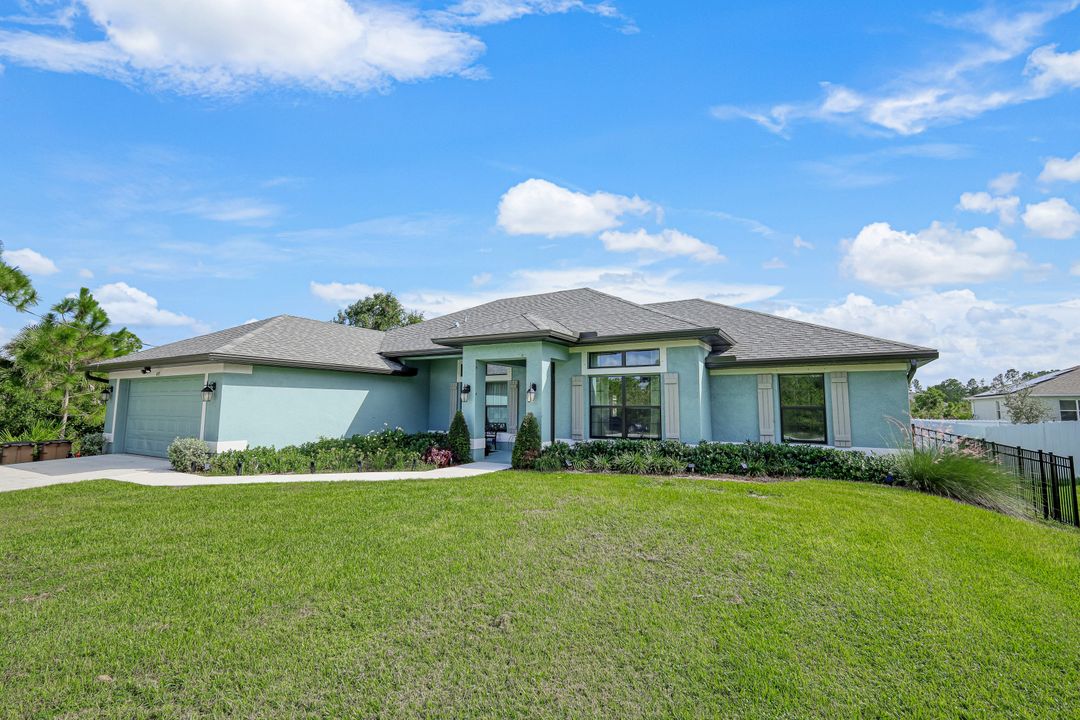 497 Windermere Dr, Lehigh Acres, FL 33972
