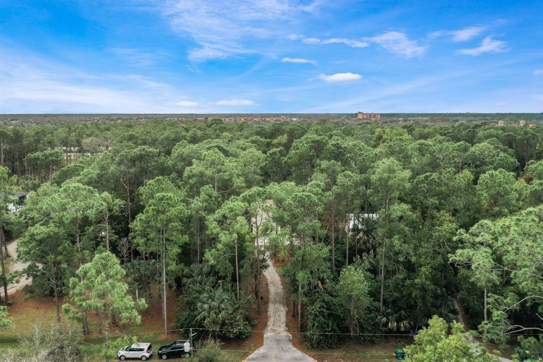 6030 English Oaks Ln, Naples, FL 34119