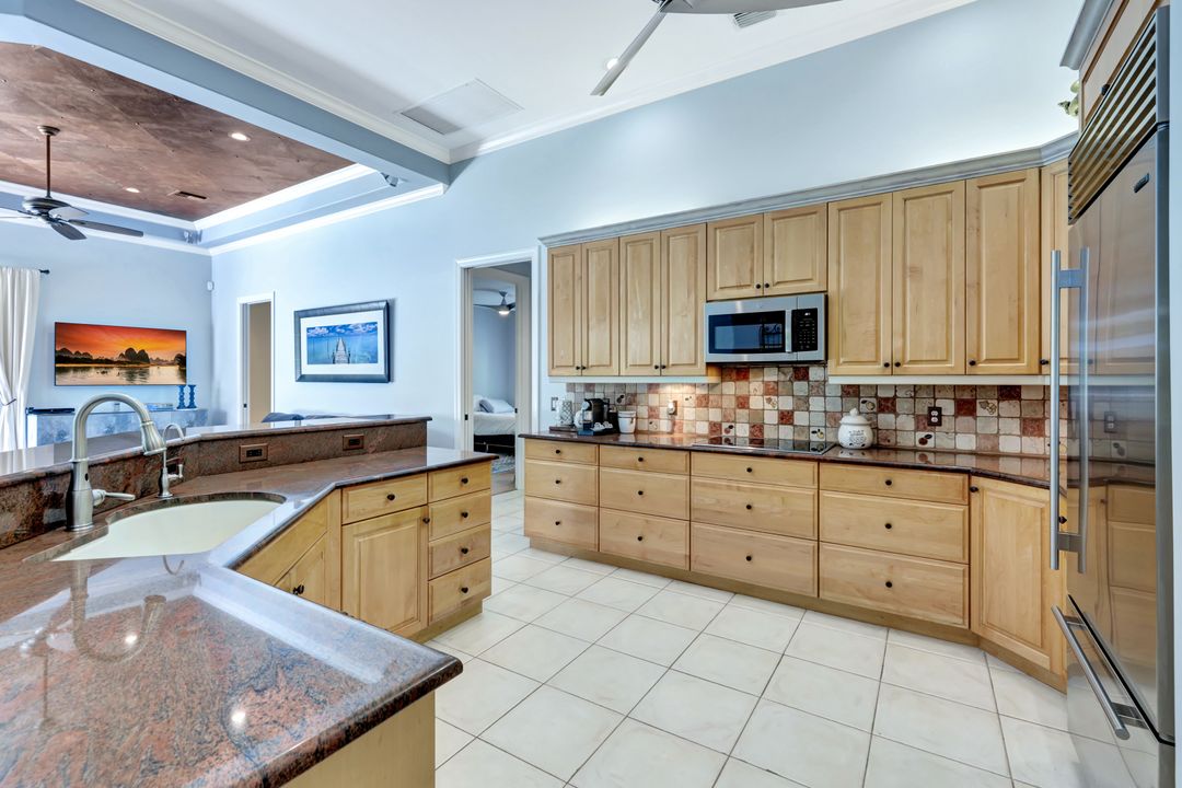 9833 Clear Lake Cir, Naples, FL 34109