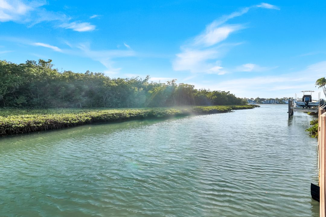 1450 Gulfstar Dr S, Naples, FL 34112