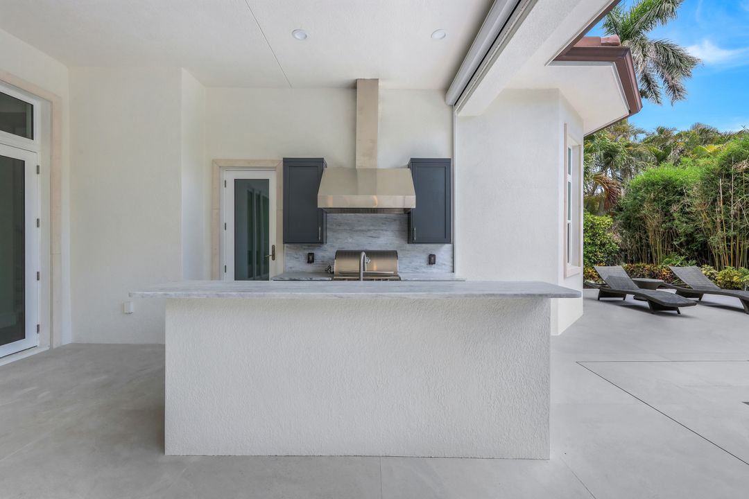 569 Neapolitan Way, Naples, FL 34103
