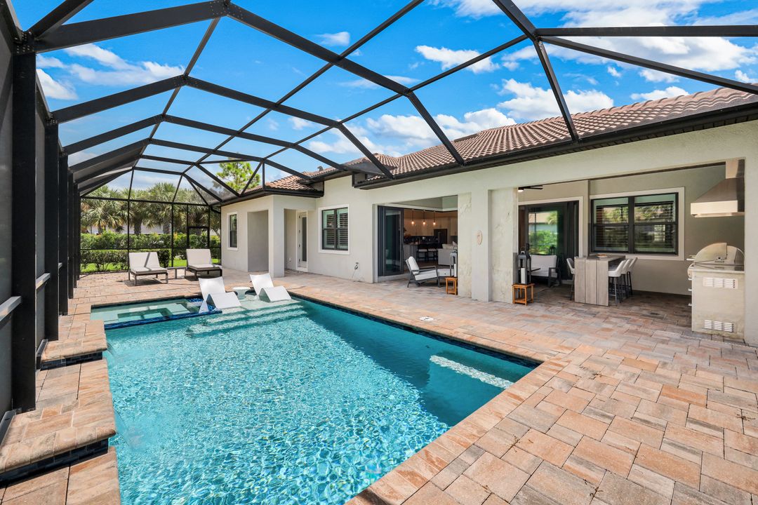 9151 Snowy Owl Wy, Naples, FL 34120