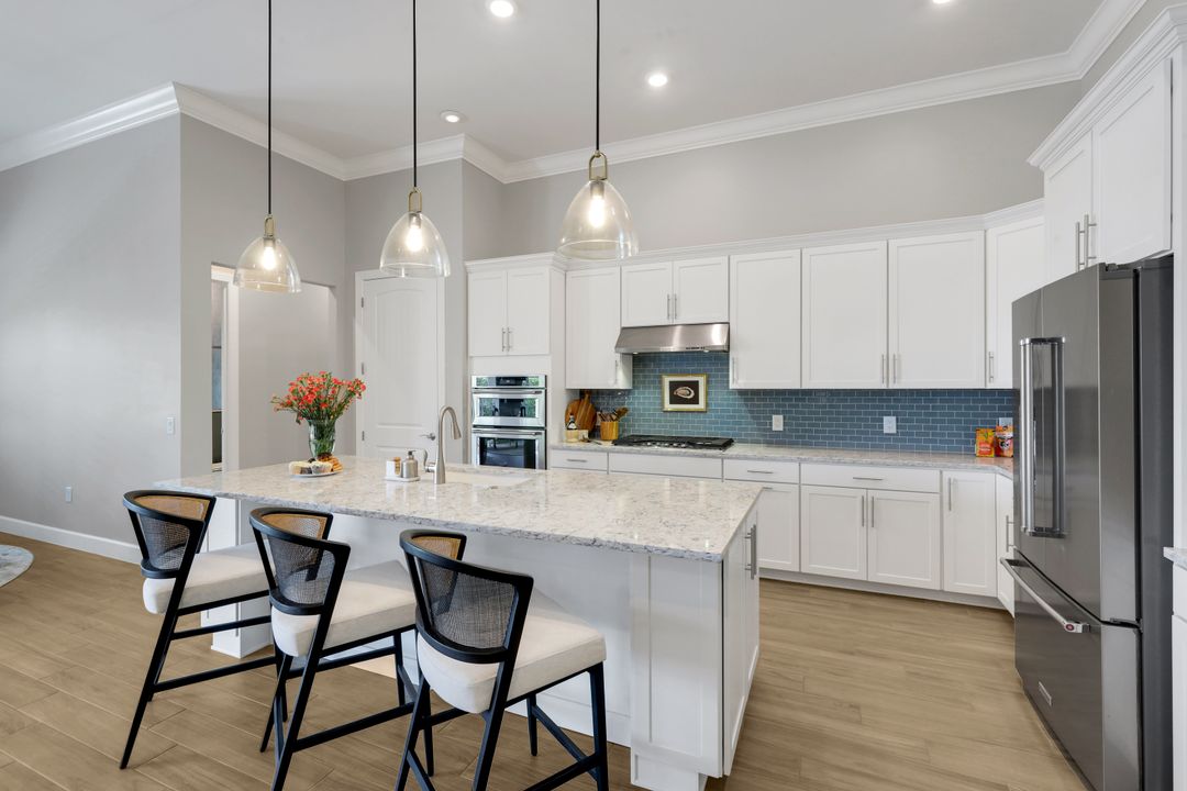 9151 Snowy Owl Wy, Naples, FL 34120