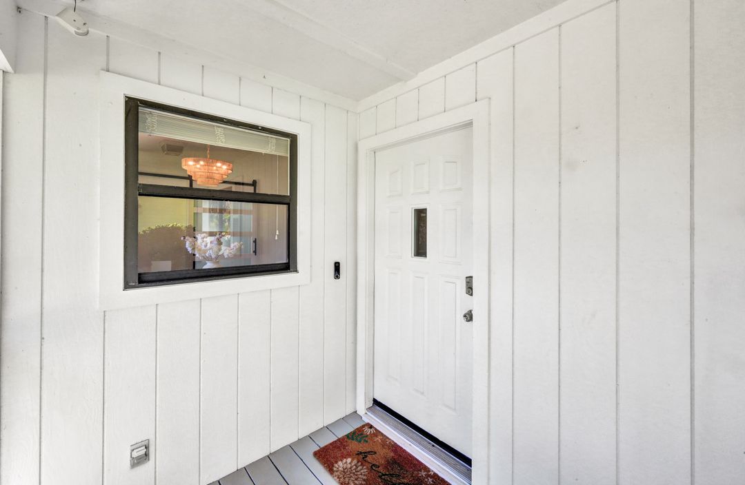 1285 Grand Canal Dr, Naples, FL 34110