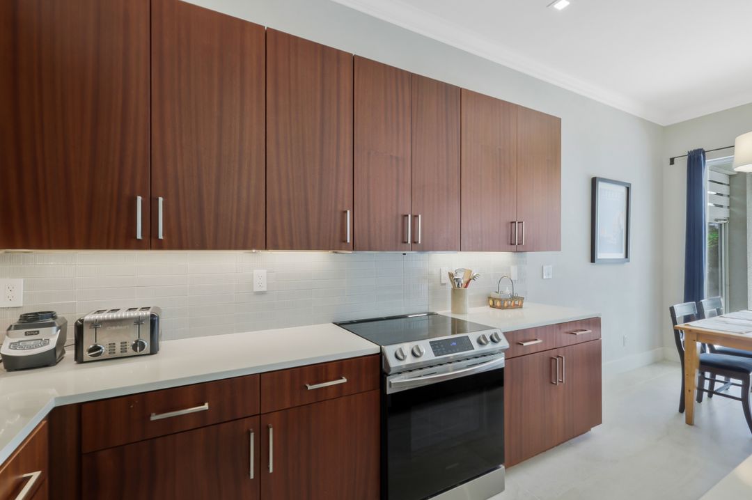 5717 Lago Villaggio Way, Naples, FL 34104