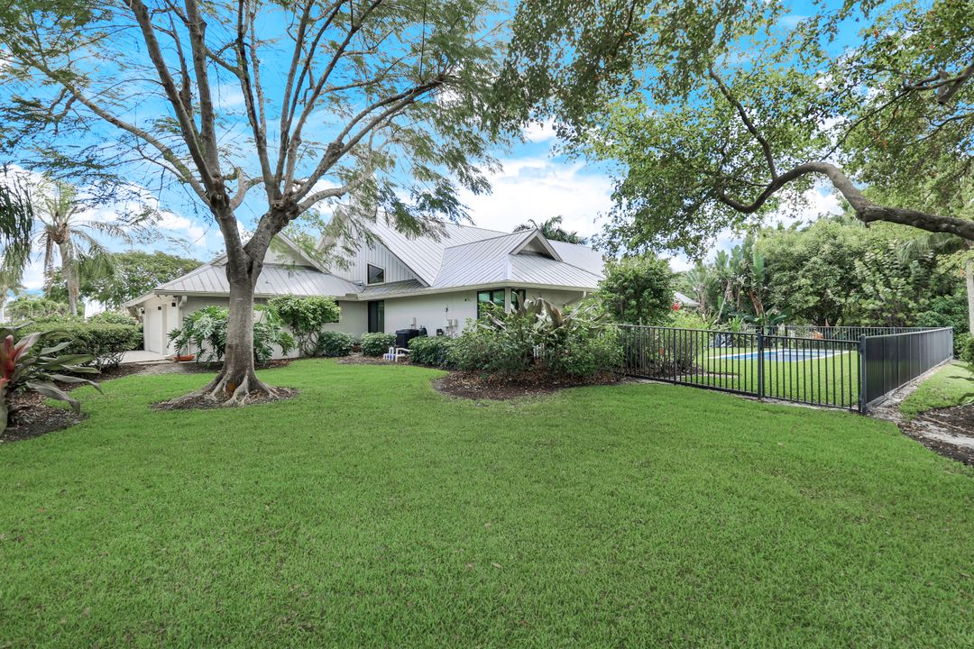 12975 Bald Cypress Ln, Naples, FL 34119