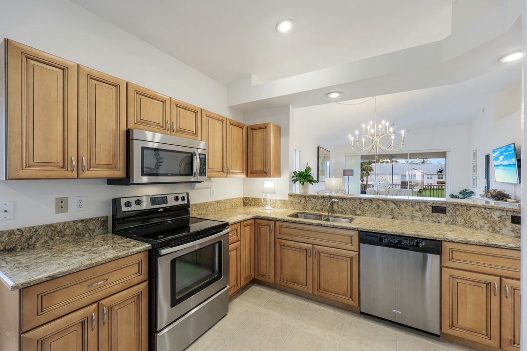 437 Wiggins Lake Ct #201, Naples, FL 34110