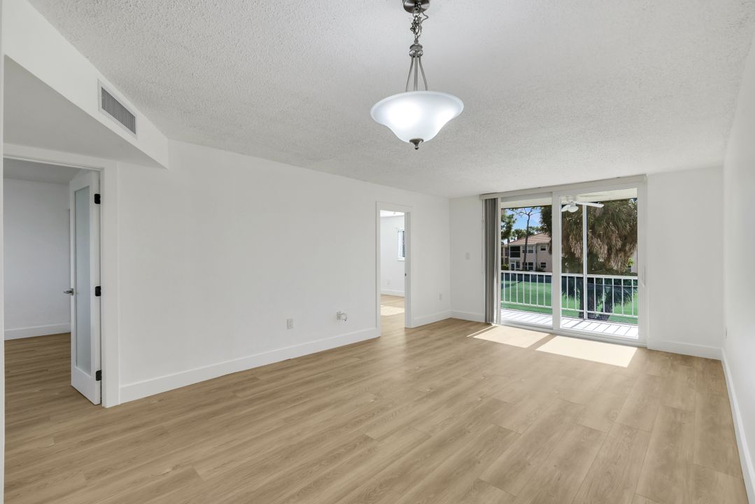 225 Turtle Lake Ct #209, Naples, FL 34105