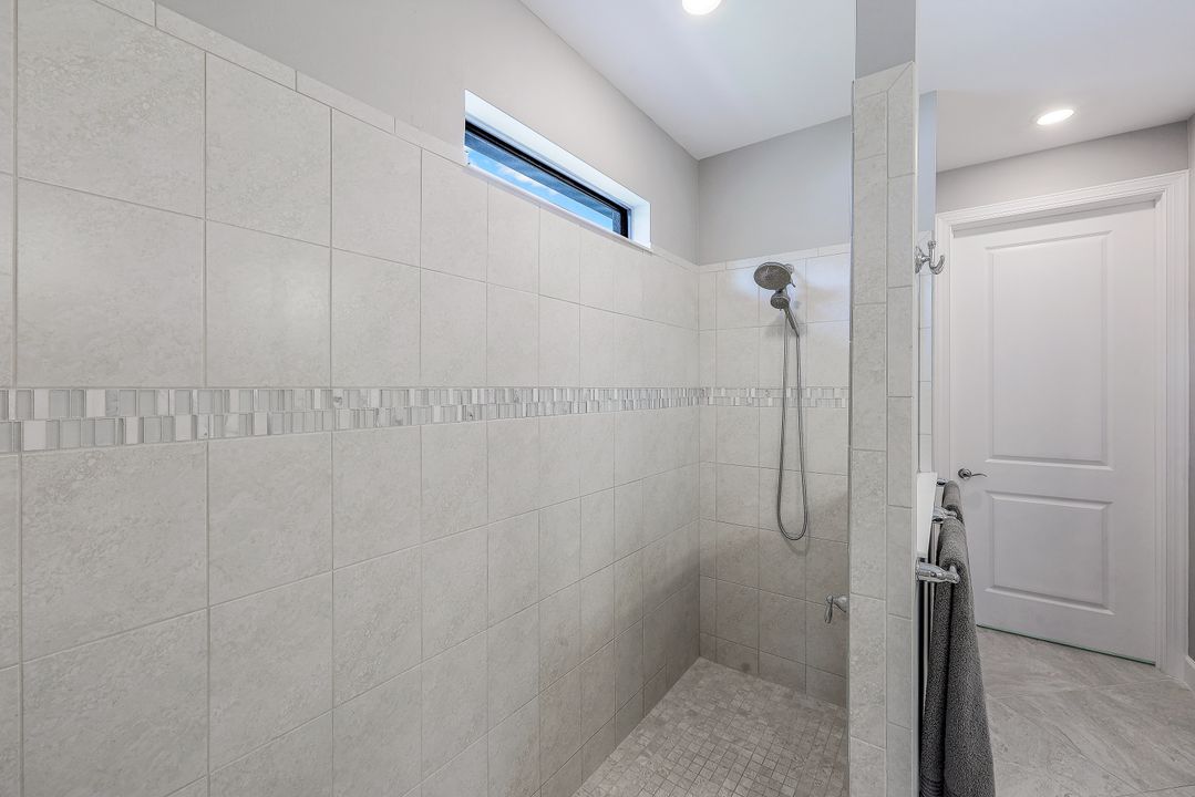 7692 Winding Cypress Dr, Naples, FL 34114