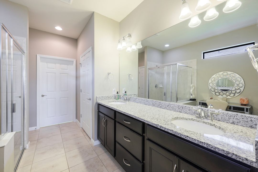 7408 Winding Cypress Dr, Naples, FL 34114