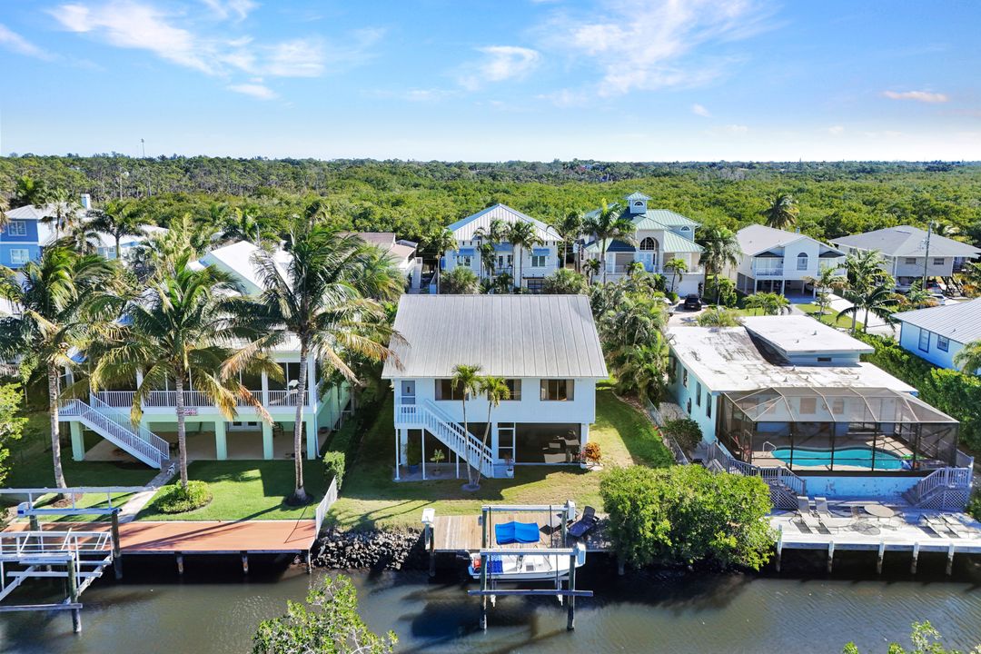 1285 Grand Canal Dr, Naples, FL 34110