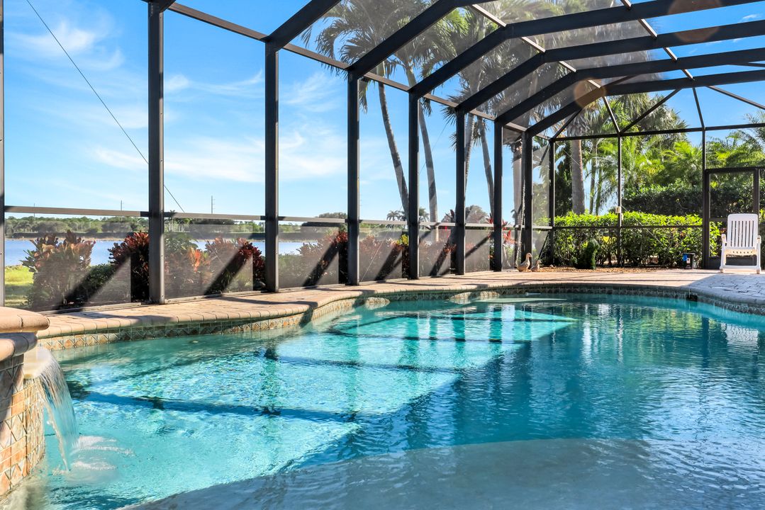 8765 Hideaway Harbor Ct, Naples, FL 34120