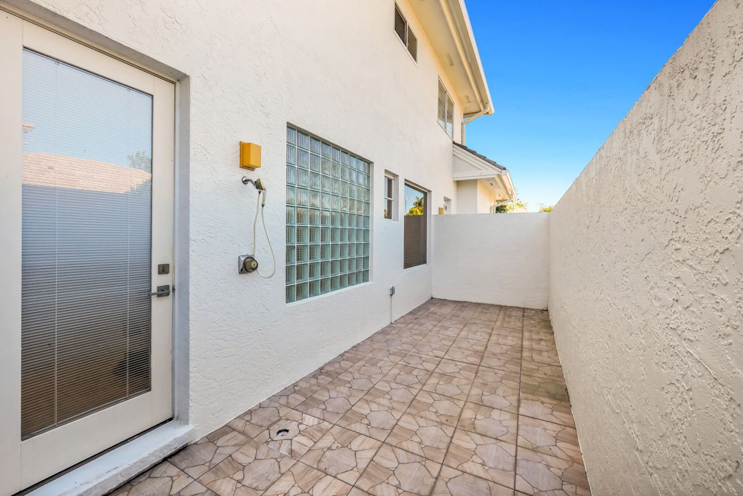 12924 Bald Cypress Ln, Naples, FL 34119