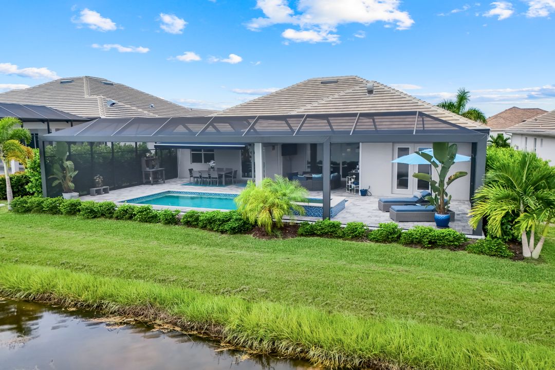 14386 Laguna Spgs Ln, Naples, FL 34114