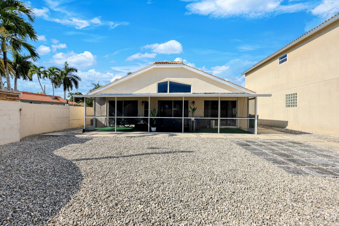 5018 Eclipse Ct, Naples, FL 34104