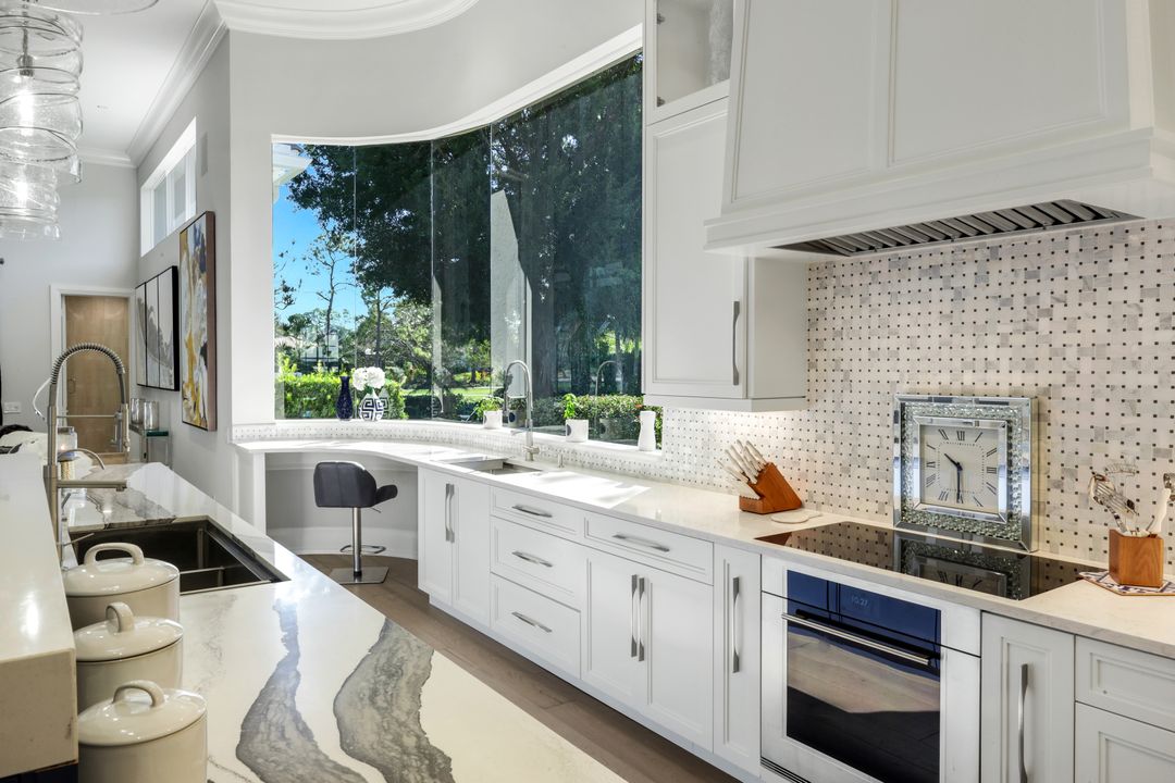 12924 Bald Cypress Ln, Naples, FL 34119