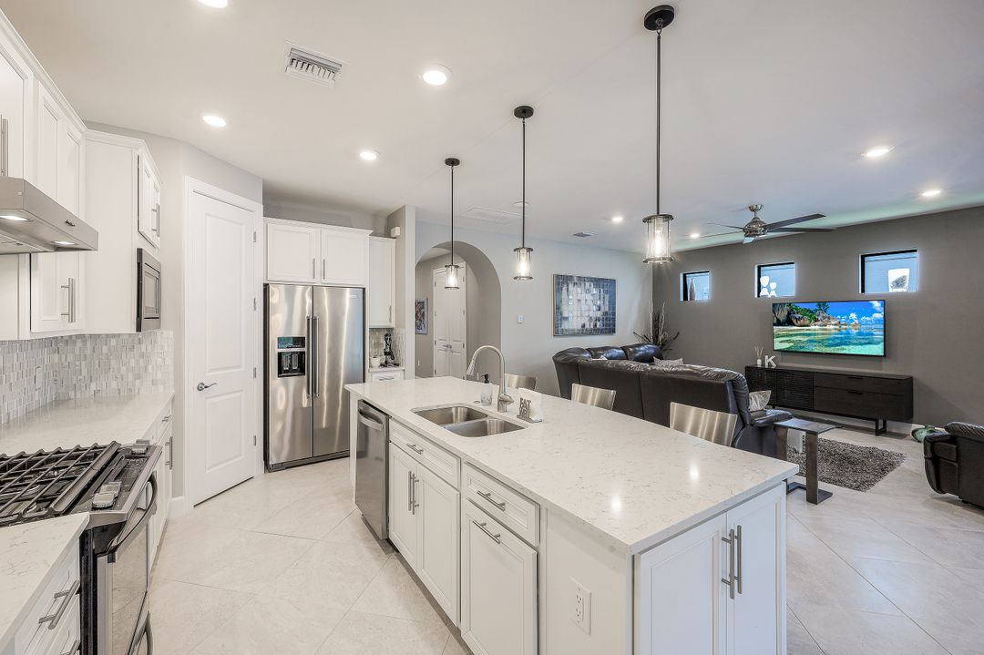 7692 Winding Cypress Dr, Naples, FL 34114