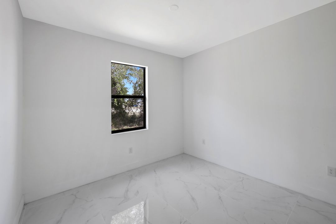 100 Parish Dr, Lehigh Acres, FL 33974