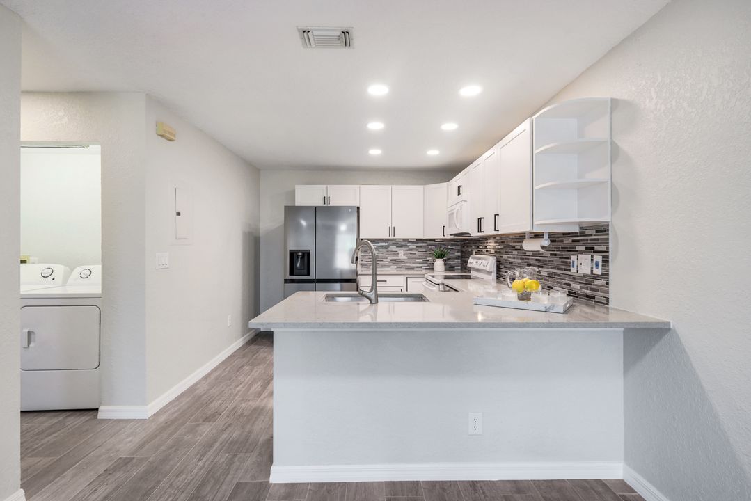 66 Emerald Woods Dr #H7, Naples, FL 34108