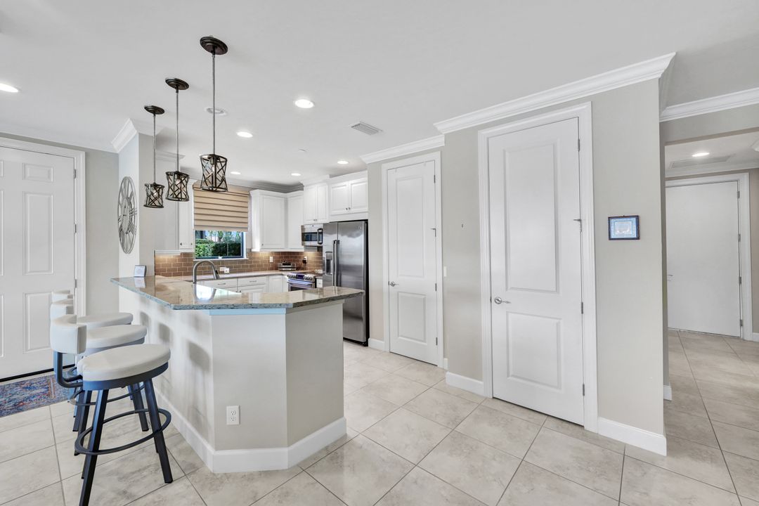 8772 Bellano Ct  #104, Naples, FL 34119