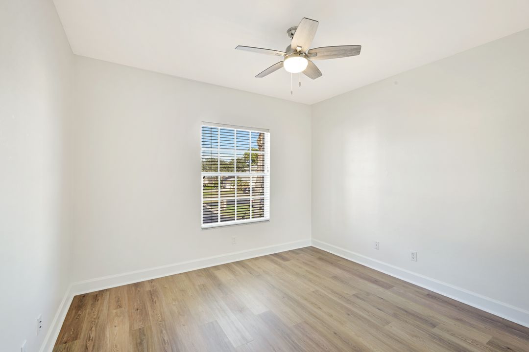 675 Wiggins Lake Dr #202, Naples, FL 34110