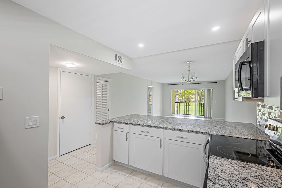 201 Quail Forest Blvd #202, Naples, FL 34105