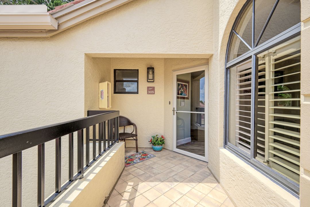 7048 Pelican Bay Blvd #305, Naples, FL 34108