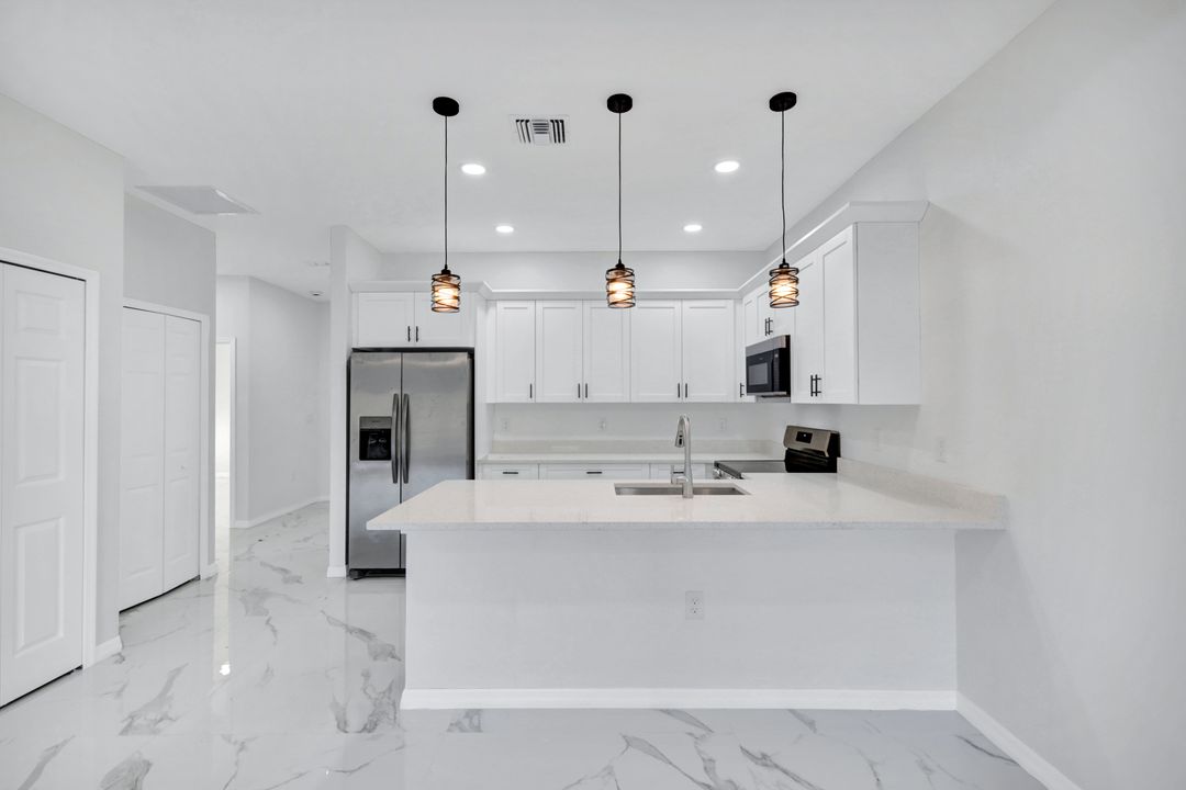 1237 Hillcrest St E, Lehigh Acres, FL 33974