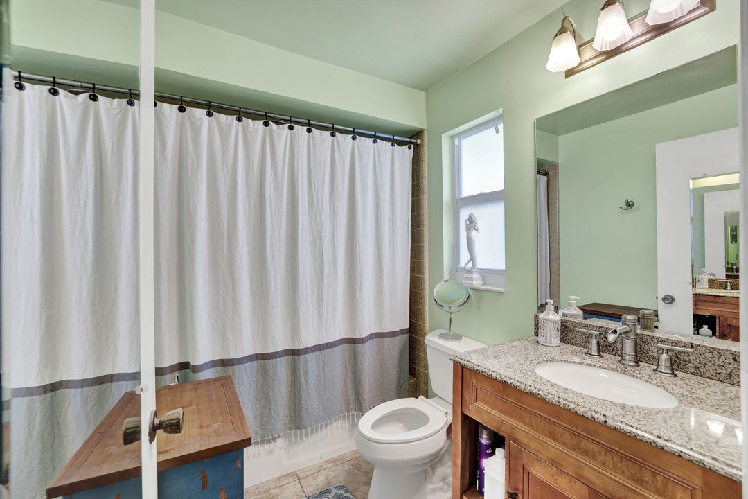 208 Baltusrol Dr, Naples, FL 34113