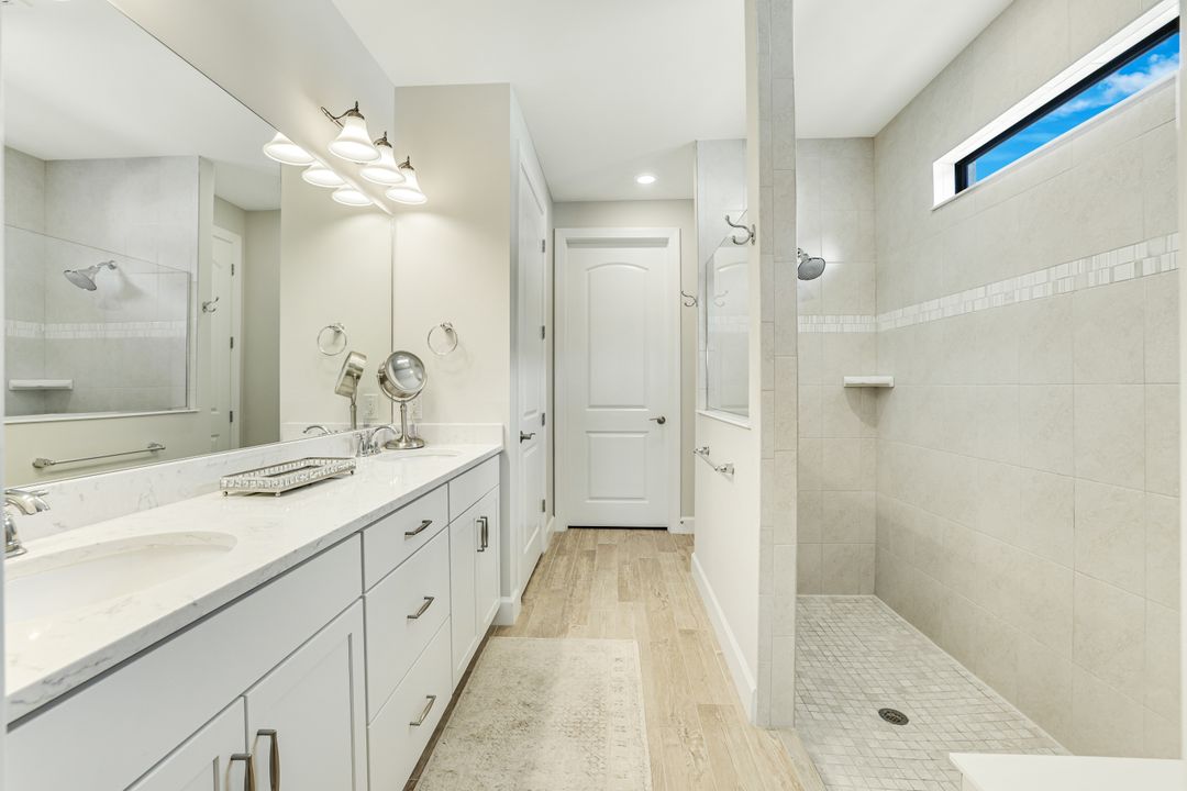 7631 Winding Cypress Dr, Naples, FL 34114