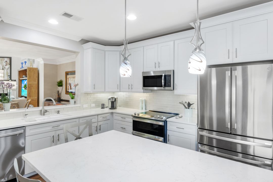 11426 Quail Village Way, Naples, FL 34119